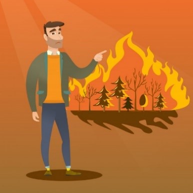 Hombre de pie en el incendio forestal. | Vector Premium